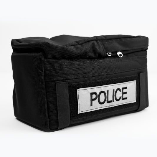 Side view of the ABPS Bike Patrol Rear Trunk Bag while showing the police Velcro tag.
