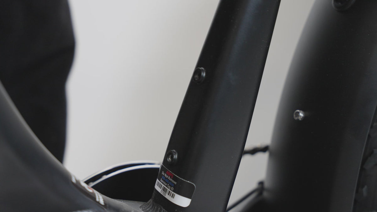 Showing how to install the air tag holder without and without the water bottle cage  and showing what the air tag holder looks like.